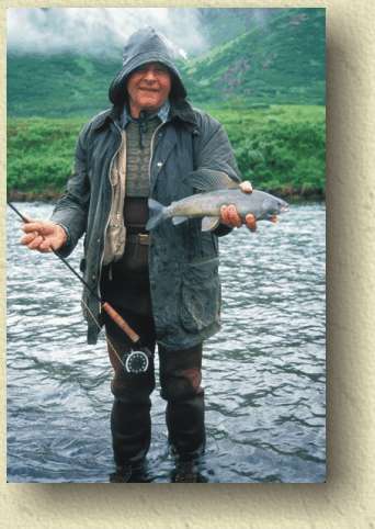 Helmut uses a waterproof Barber Jacket for a rainy day on a river in Western Alaska.